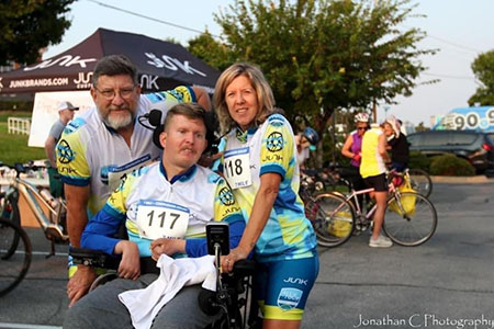 The Fohner family, Josh, Mike and Kelly, at a cycling event.